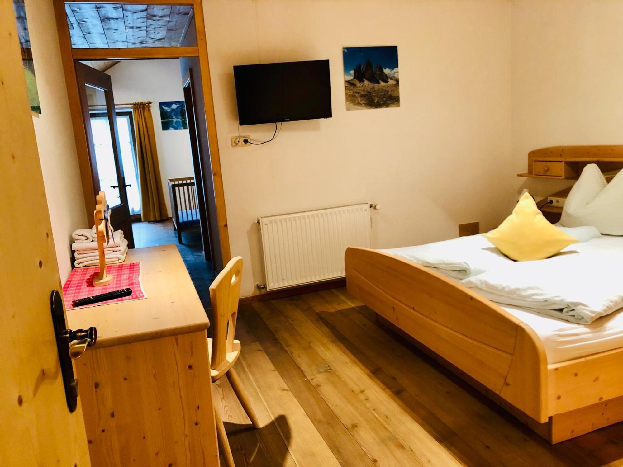 Camera Familiare con Bagno in Comune